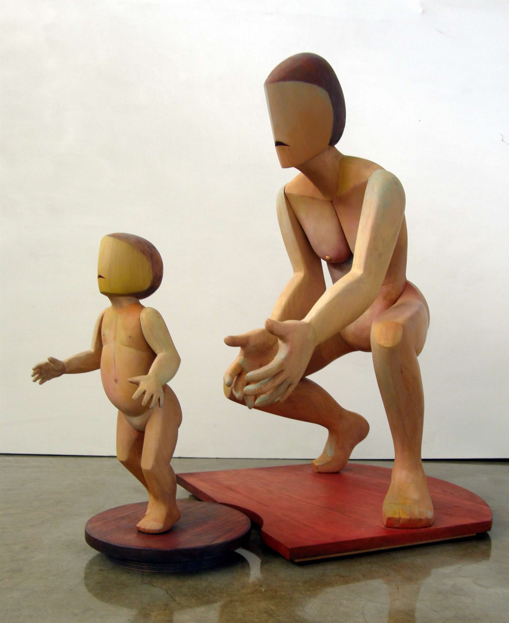 Painted wood, last revision 2004, 29" x 20" x 31". My son was born February 14, 1985, on my parents’ anniversary. From the first time my son furiously crawled across the room, looked back with gleeful eyes and a giggle, turned, and crawled just as furiously back, we were teaching each other the gift of letting go. My heart grew resilient from the exercise of constricting with apprehension over the departures and bursting with relief when either of our sons returned. My first gift was an extraordinary pair of parents. I had no choice in the matter, but how I parent is a choice, a gift I give, choosing the quality and size of the gift moment by moment. I have always thought it odd that unlike the word “parent,” the word “child” is only a noun, never a verb. Yet, how I “child,” how I give in return also became a choice as I grew to adulthood. I have been asked if I ever mourn the sculptures that never were because the space, time, money and solitude to create them rarely came together during my parenting years. I don’t. The gift of parenting was far greater than what I gave away. It forced me out of seclusion and into life. It demanded that I become a better person. It deepened my artistic well.